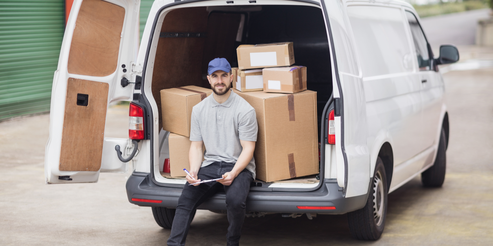 Mover with boxes on moving van