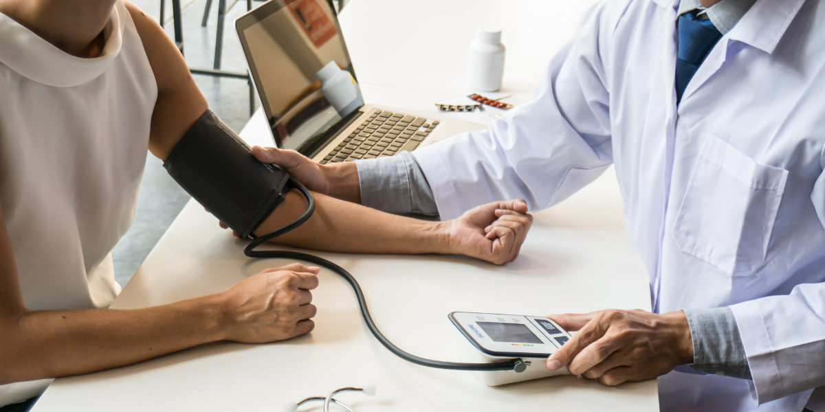 Doctor Taking Blood Pressure