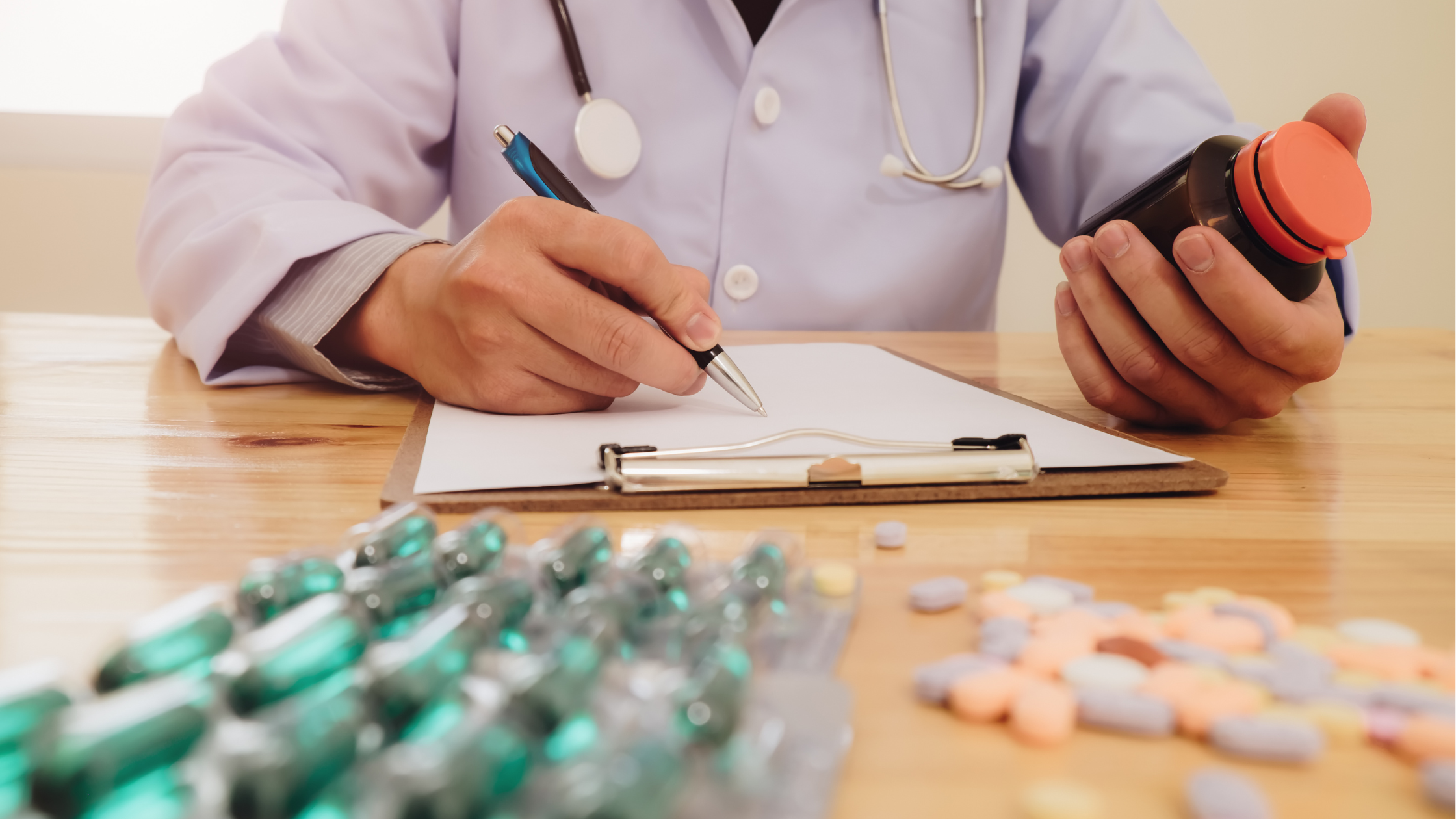 Doctors signing prescription drugs