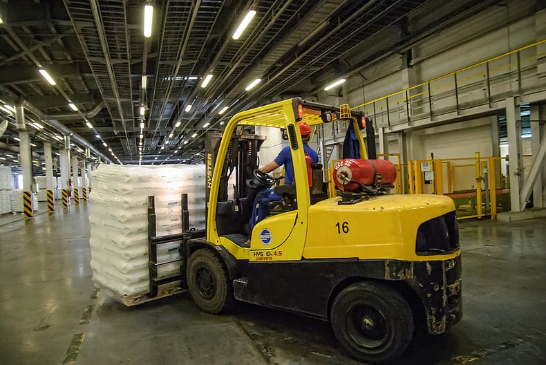 Person driving forklift