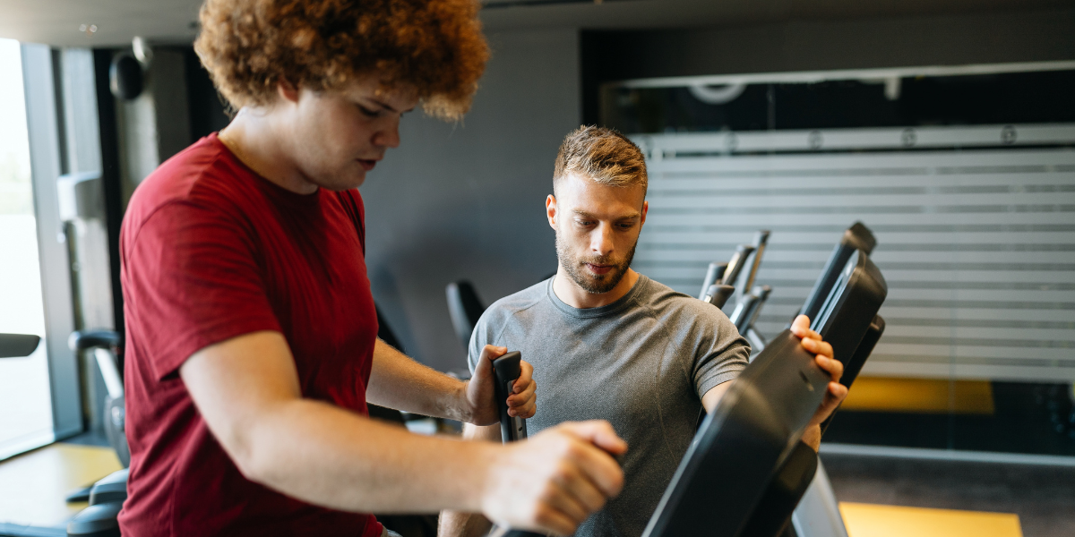 Personal trainer and client