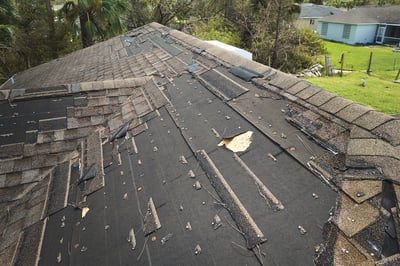 Roof damaged and missing shingles