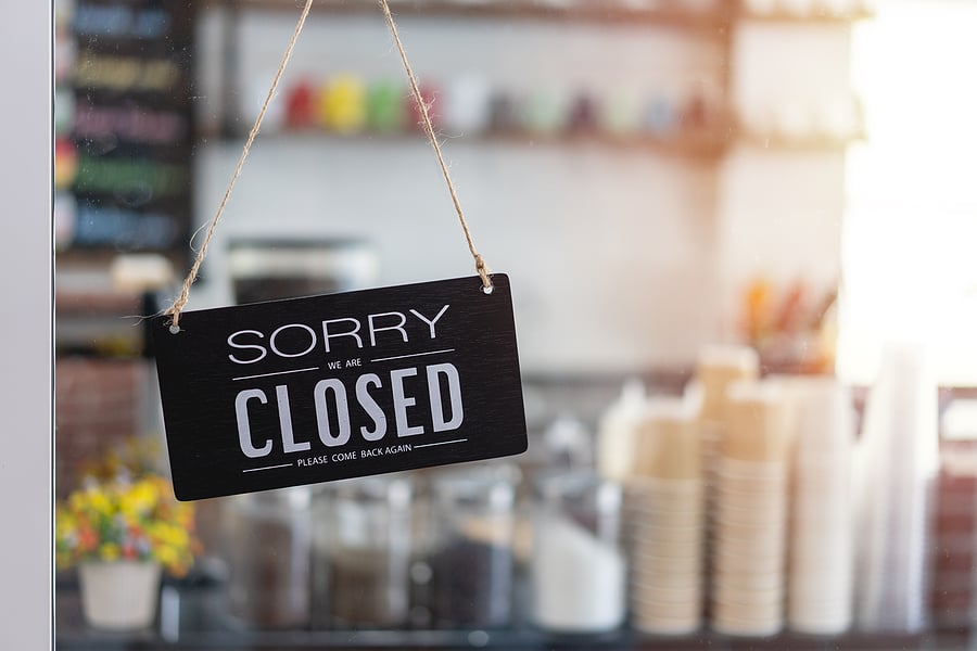 "Sorry, we're closed." sign