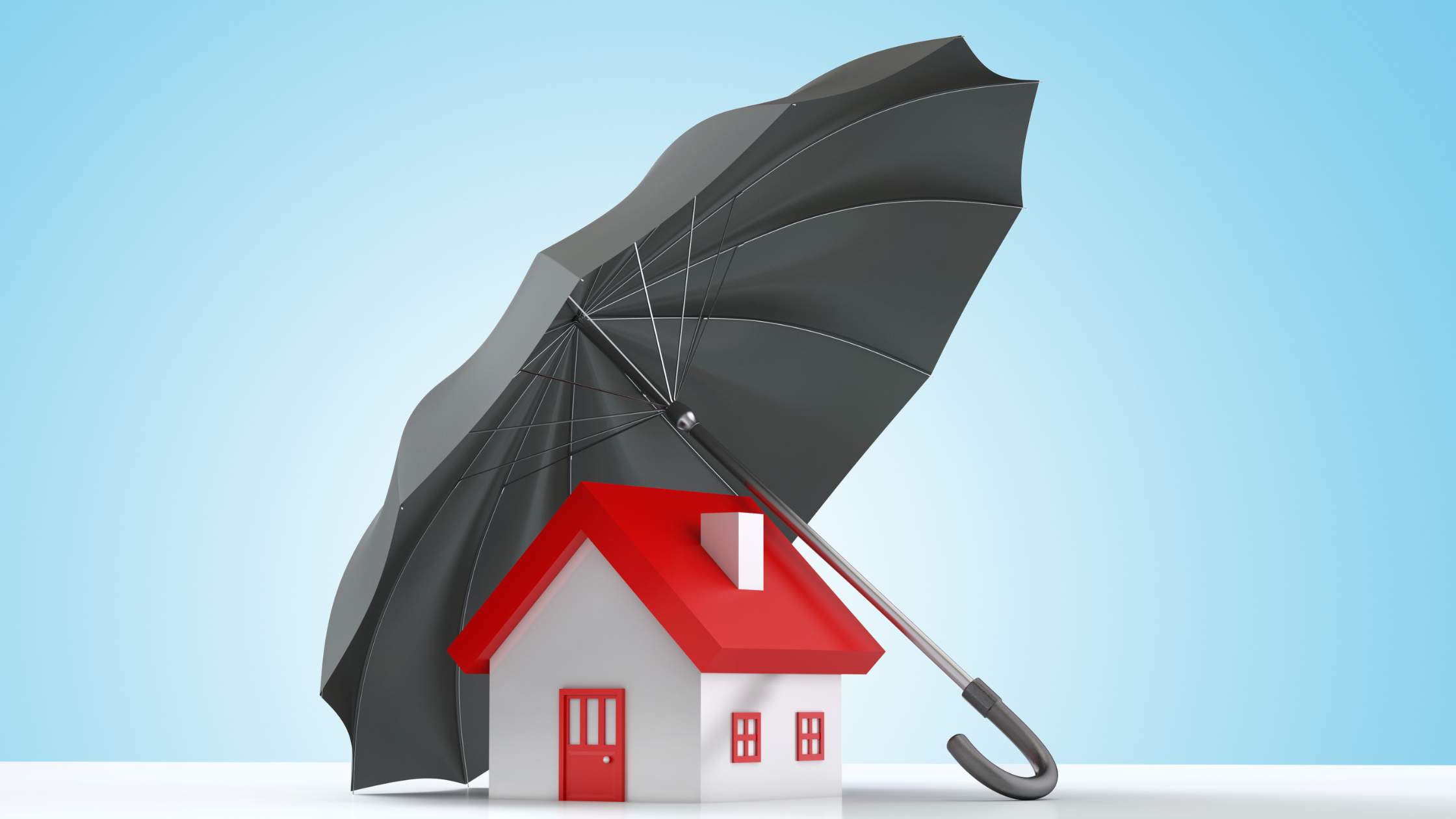 house protected by umbrella