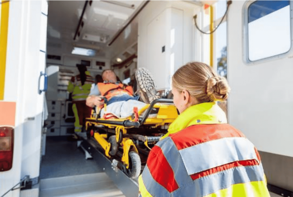 EMT putting a person in an ambulance