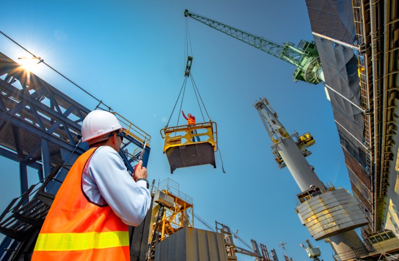 Contractor in hardhat at construction site