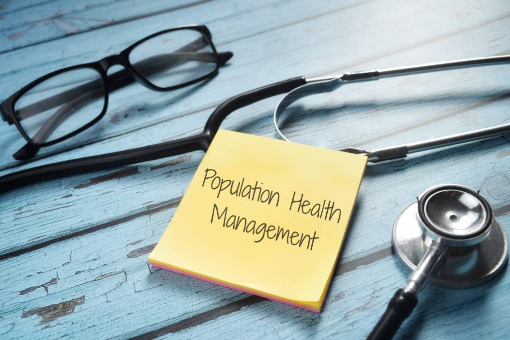Population health management written on a sticky note