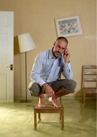 man in flooded room