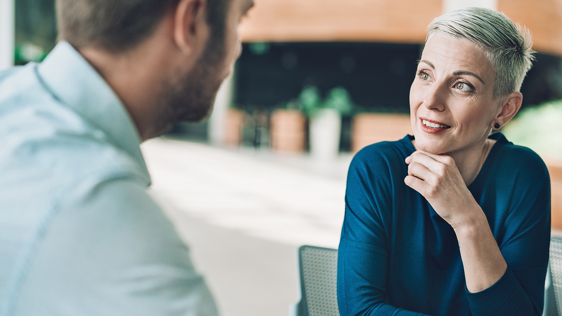 Two people talking