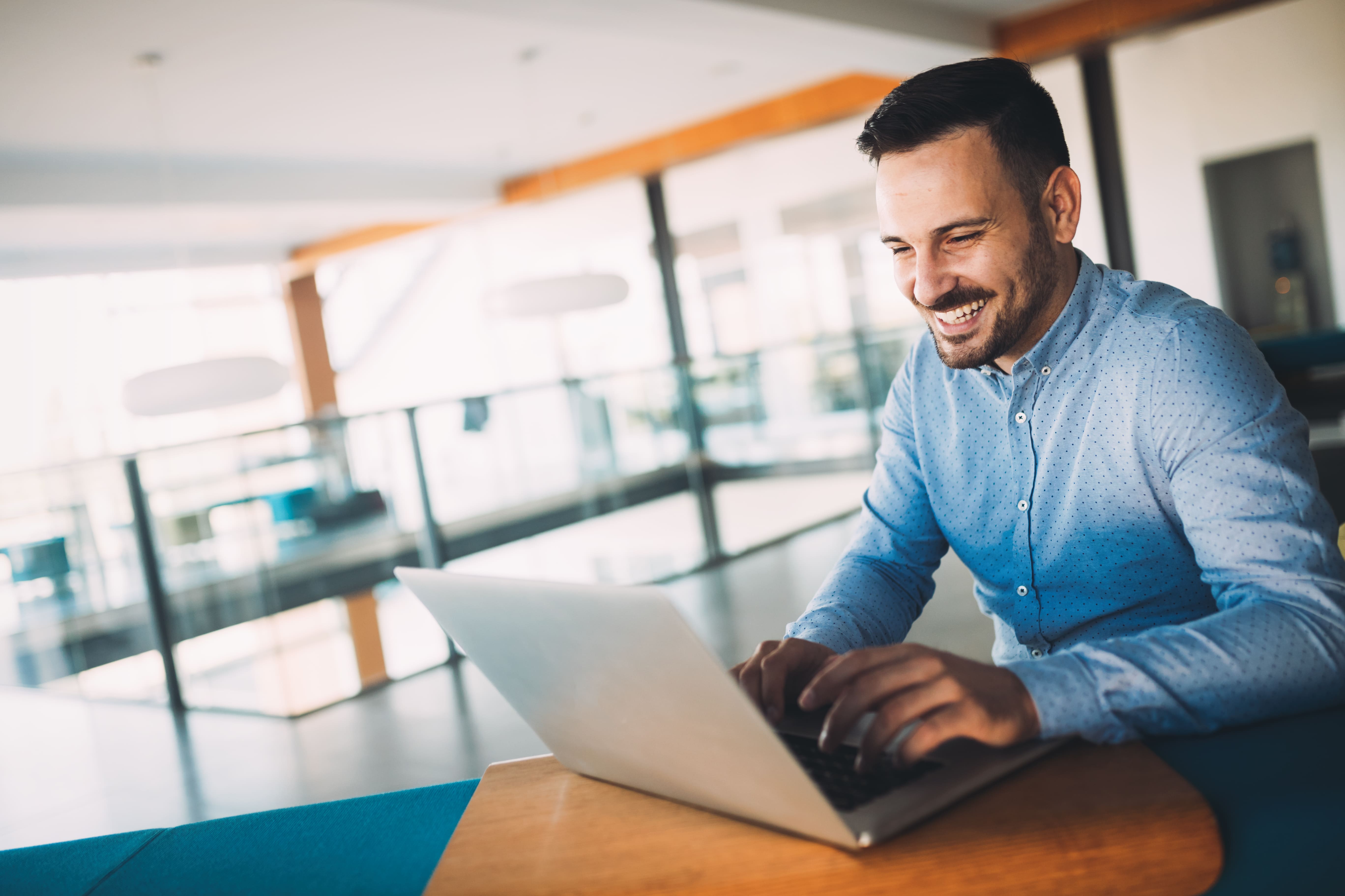 Man working on computer at table